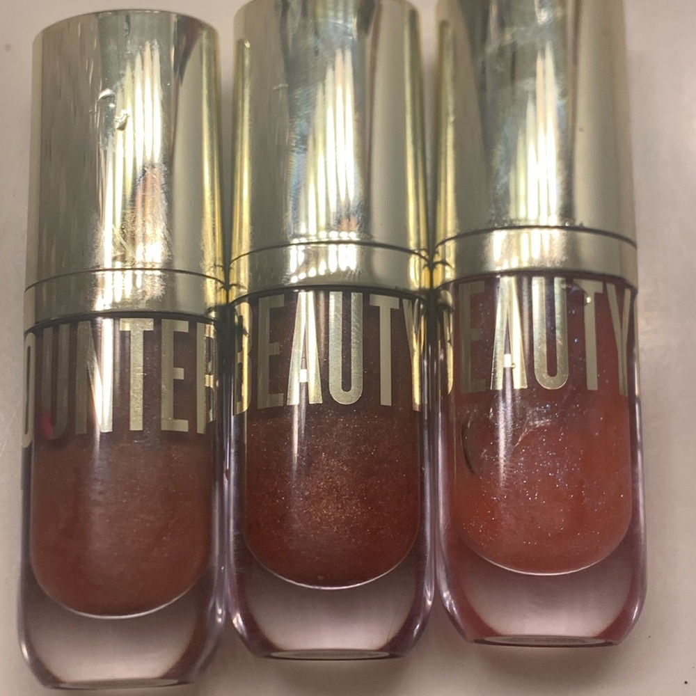 HUDA BEAUTY Shimmer Lip Gloss Trio — Bronze, Copper, Warm Rose